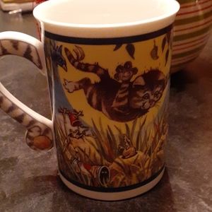 7.  "on the prowl" Danbury Mint cup